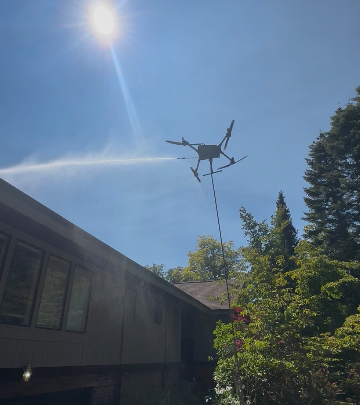 Drone cleaning a building facade